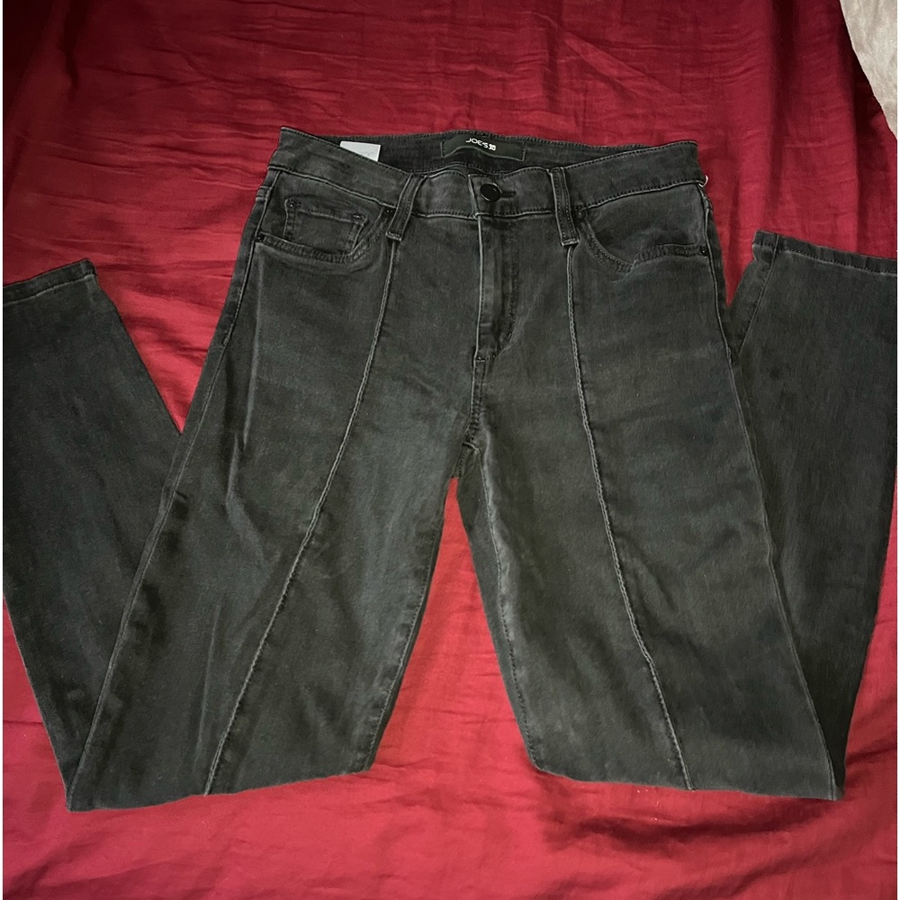 Black denim mid rise skinny jeans w/ slit at ankles